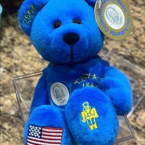Blue and Yellow Stuffed Animal with Embroidered Patches